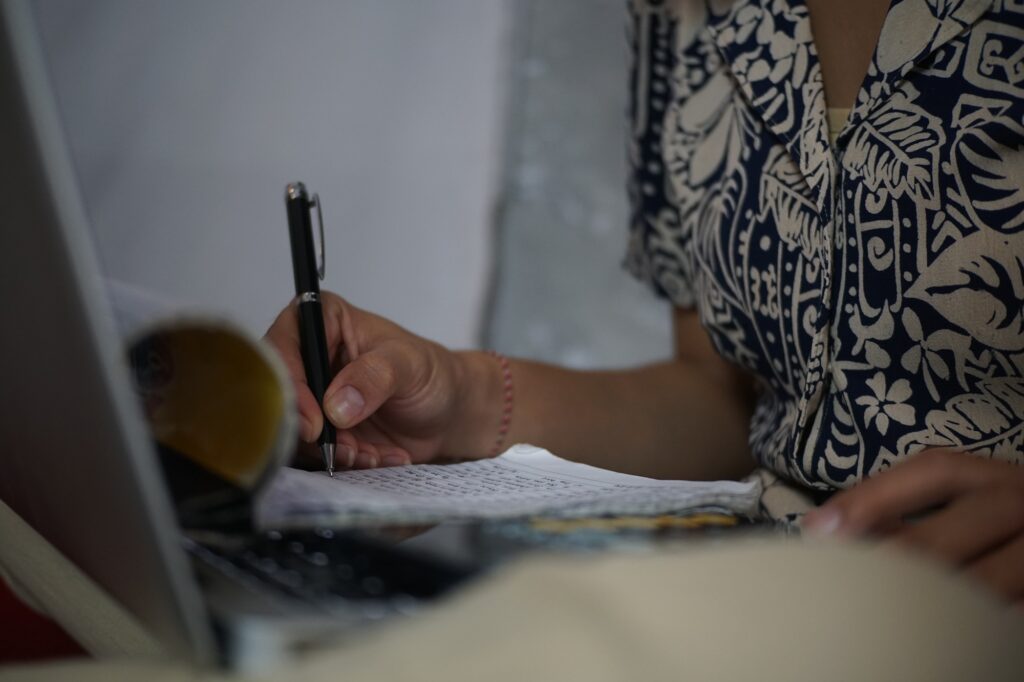 thoughtfully writing